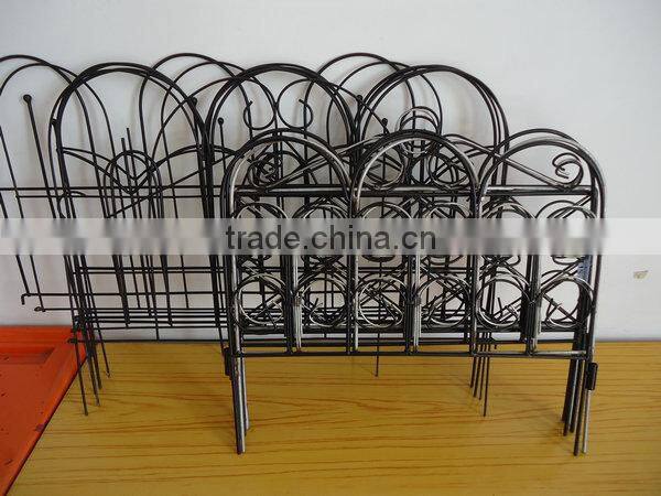 scrolled garden fence