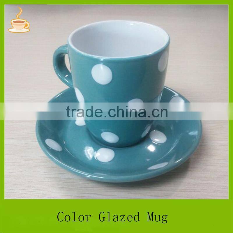 Samll size porcelain coffee mug with saucer set, black and green color glazed with white dots