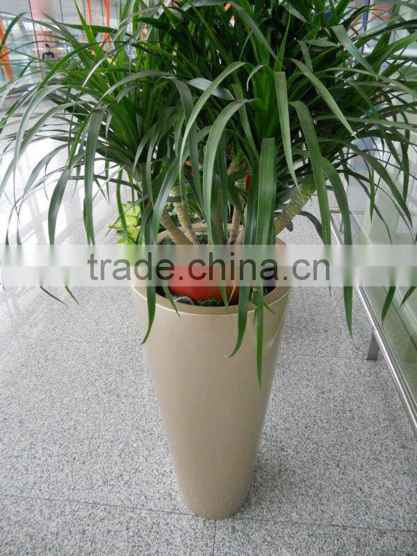 Gold fiberglass planter
