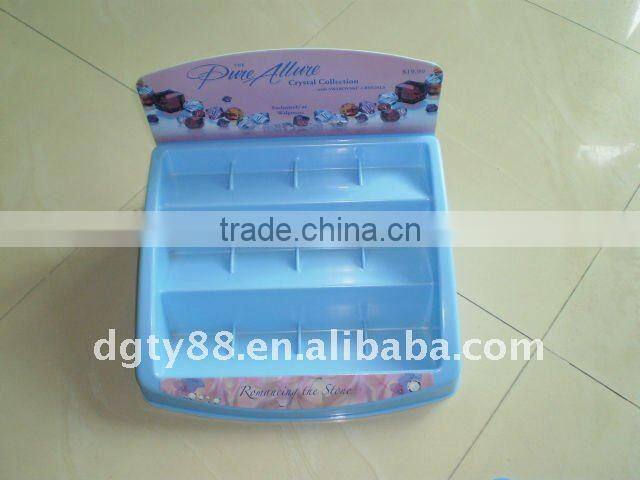 Vacuum forming plastic display for cosmetic