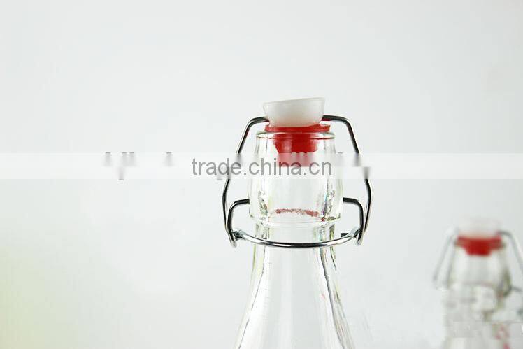 glass milk juice bottle with metal clamp lid and woven belt coating