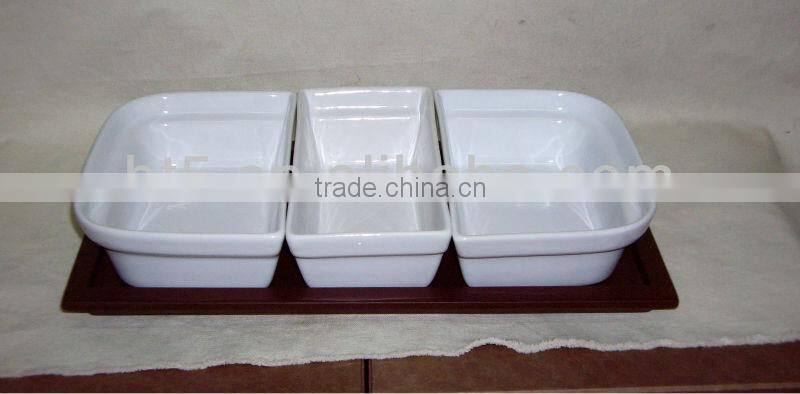 Different shaped white stoneware snack plate with tray
