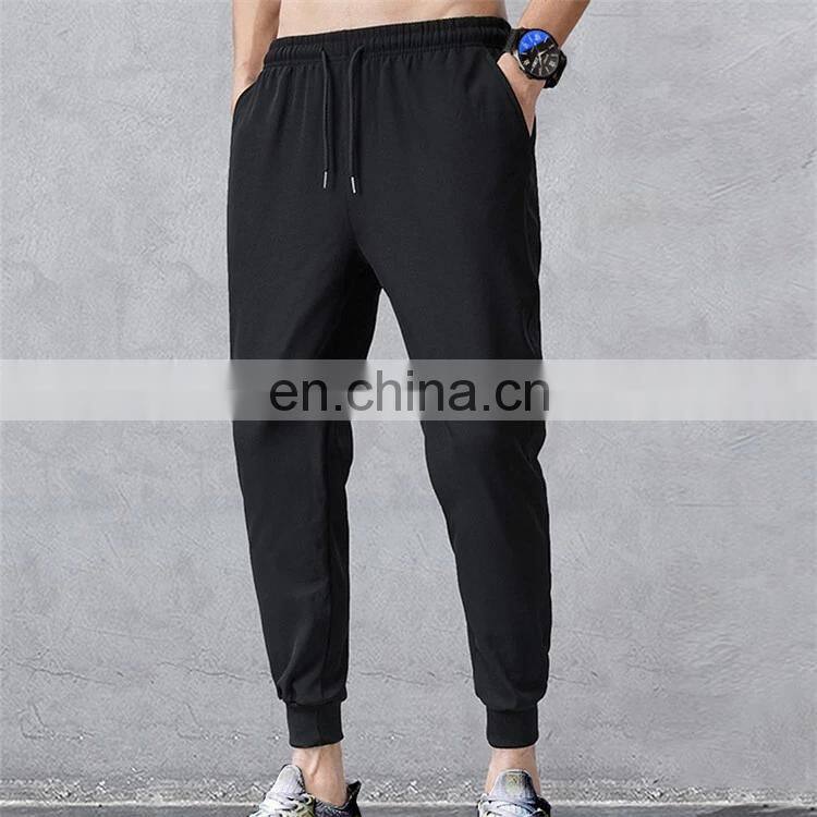 Wholesale custom brand logo men's new polyester cotton loose casual sports jogging pants