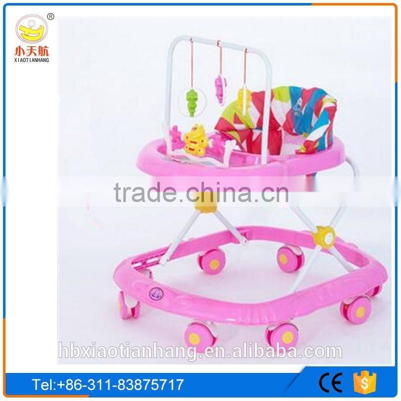 Simple rolling baby walker with toys and music/ Cheap round outdoor baby walker toys for kids