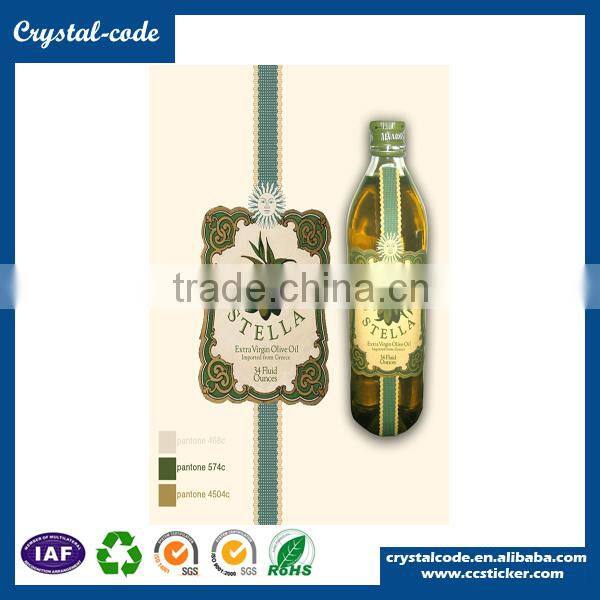 Adhesive waterproof labels for essential glass olive oil bottles