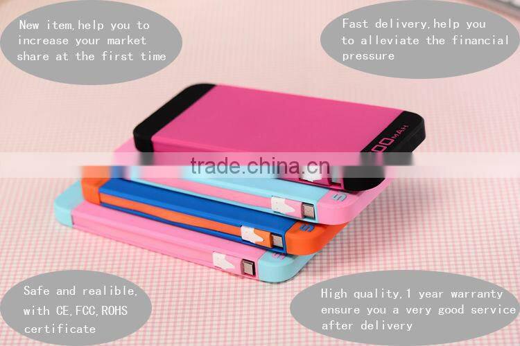 2014 High quality built in cable 5000mah silicon powerbank