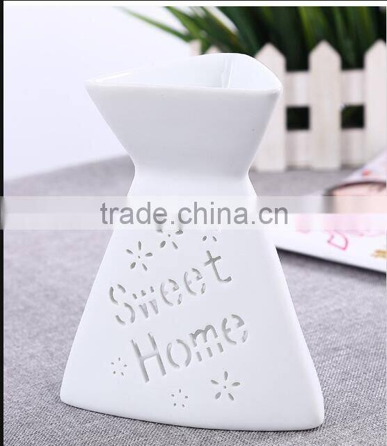 Letter engraved candle holder