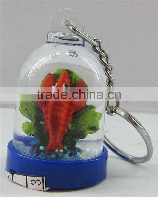 Fish snow globe used as plastic key chain