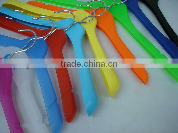 Slim black plastic hanger for T-shirt and blouse