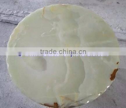 A GRADE LIGHT GREEN ONYX TABLE TOPS COLLECTION