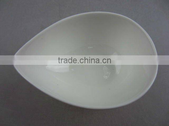 Stock white porcelain drop shaped sauce dish