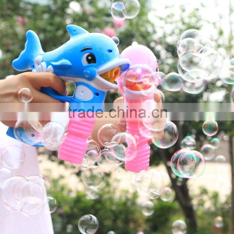 Battery operated blowing dolphin shaped bubble gun toy