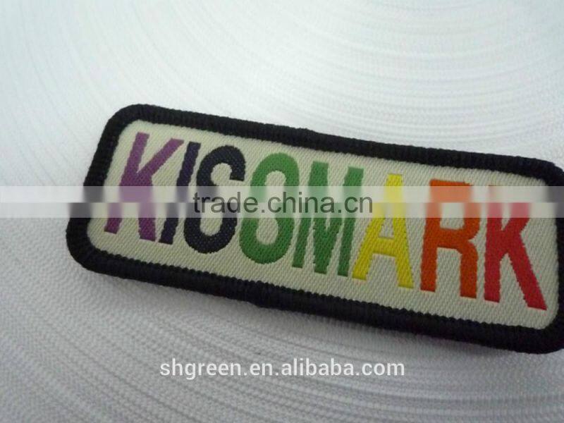Round high density woven label with serging border for kids garment