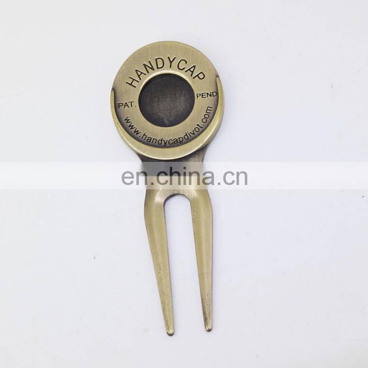 metal golf divot repair tool with golf ball marker
