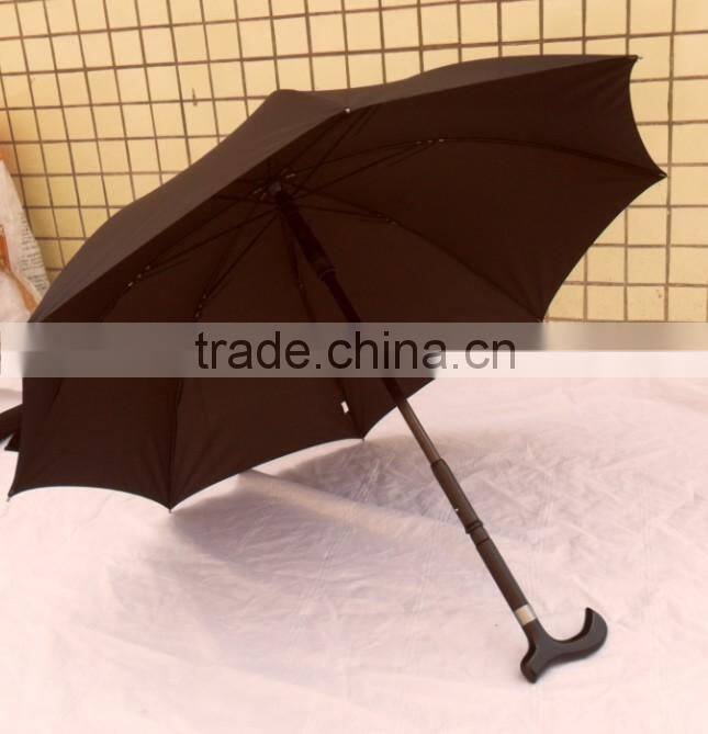 old man walking cane umbrella