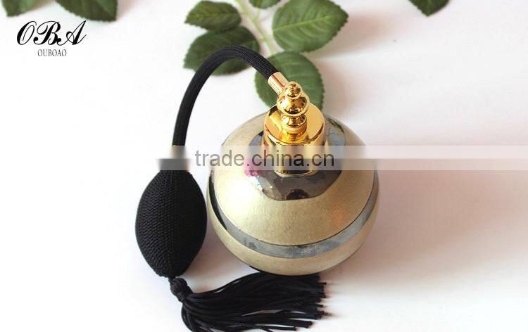 Handmade luxury european style creative air bag golden glass perfume bottle,Round empty gasbag spray glass bottle 100ml