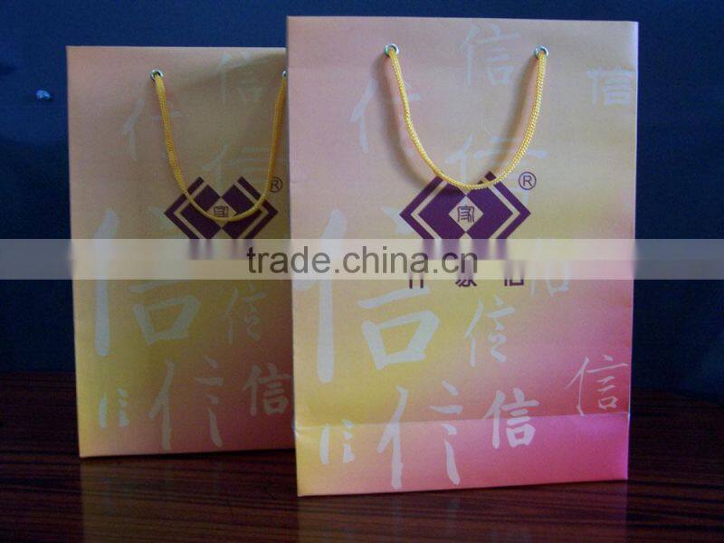 2013 wholesale beautiful and eco-friendly coated paper gift/candy bag --size22*10*24cm