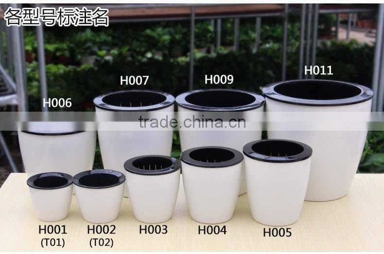 round colorful self watering flower pot