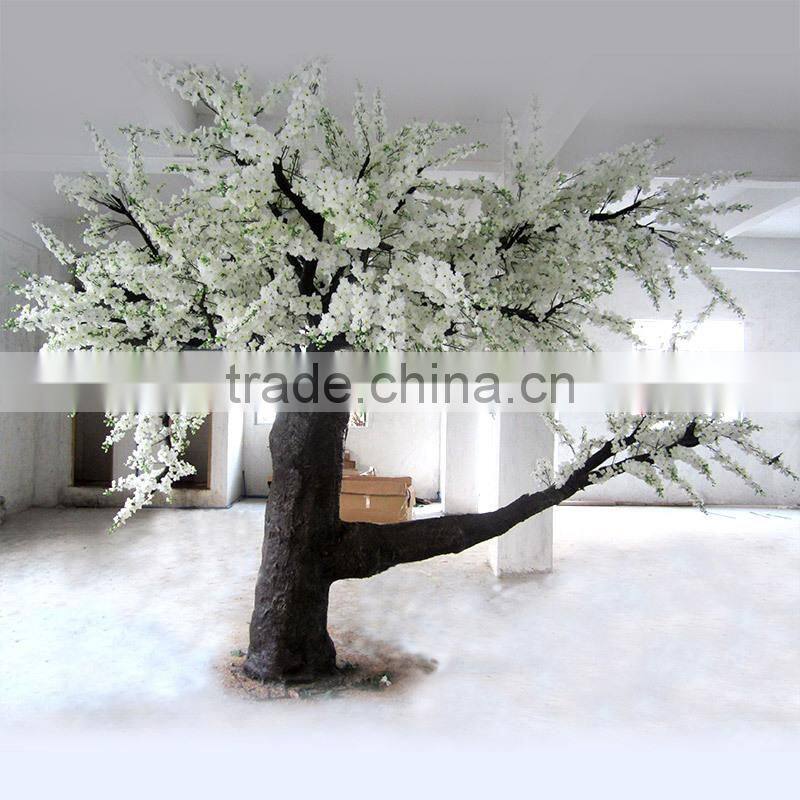 Yellow silk cherry blossom tree with artificial flower