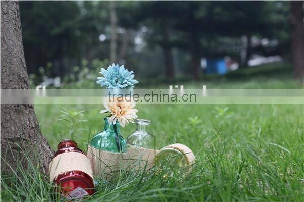 wholesale cheap small round colored glass vase for flower with linen