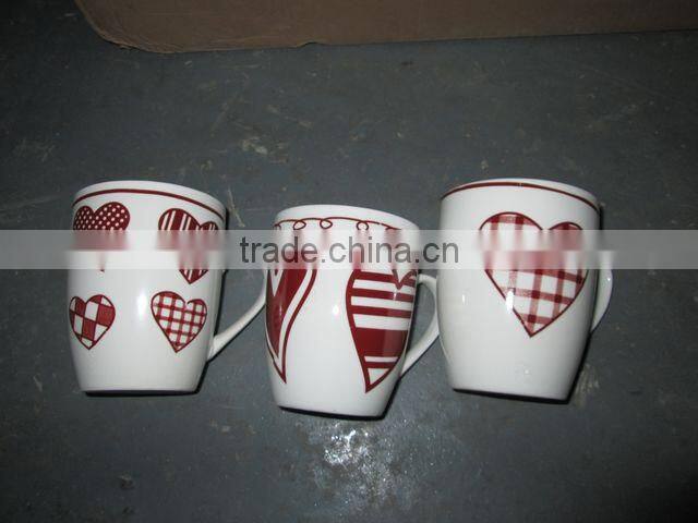 yiwu white ceramic half cup with heart shape