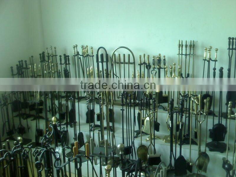 antique mechanical cast iron fireplace tools set