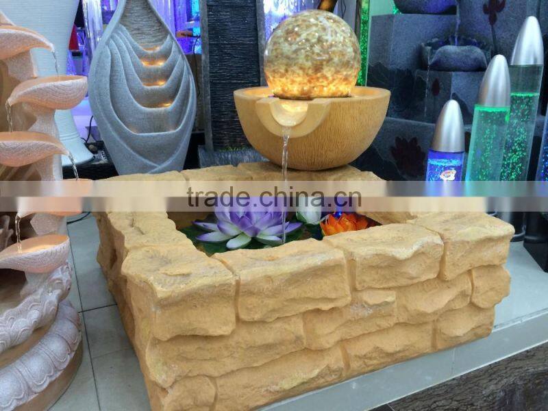 LED yellow light color resin and sandstone fountain with ball