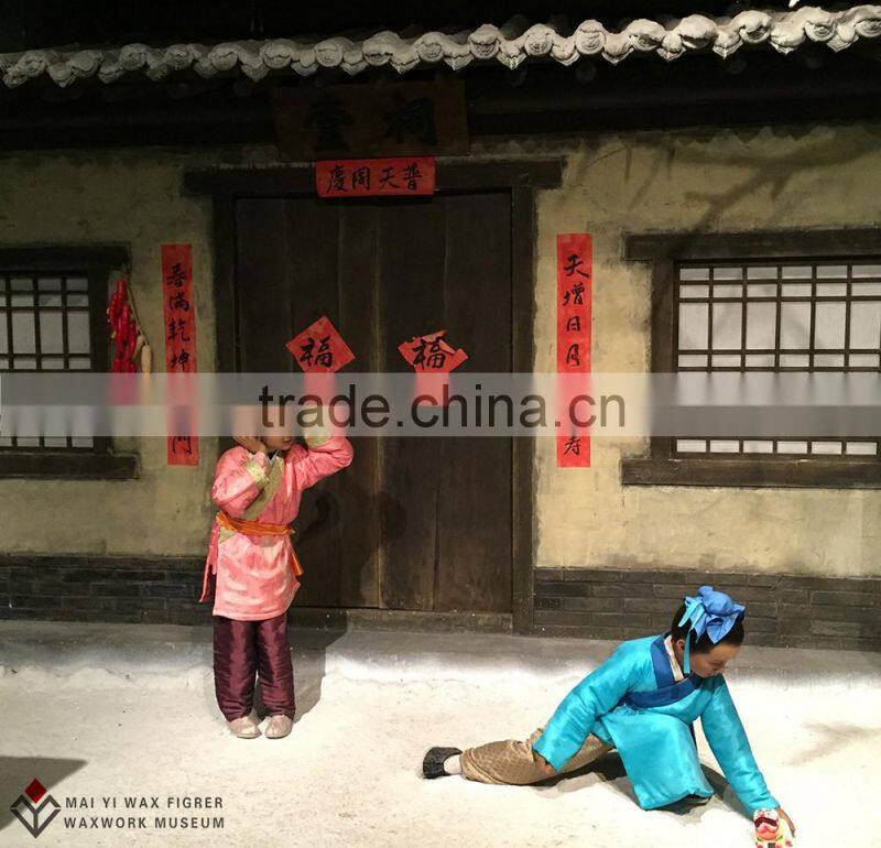 folk art sculpture of wax museum scene reproduction children play