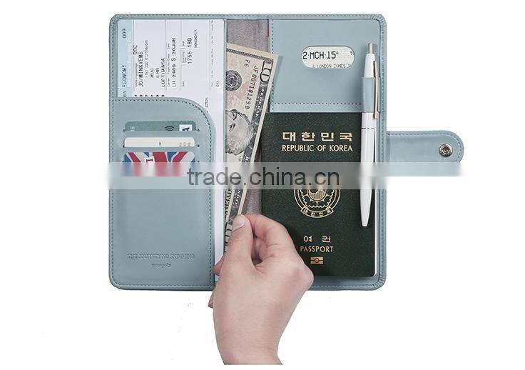 Passport holder with botton and zipper
