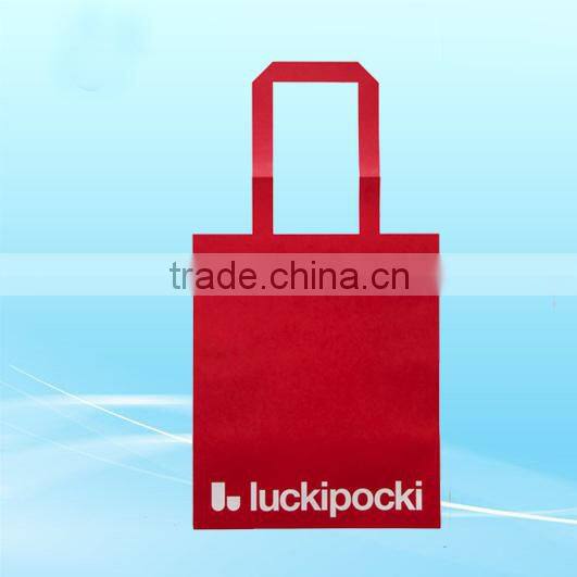 Red shopping paper bags with satin handle