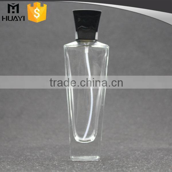 empty perfume bottle glass with black cap