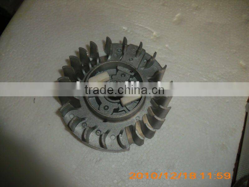 flywheel with plastic ratchet on chain saw, fly wheel