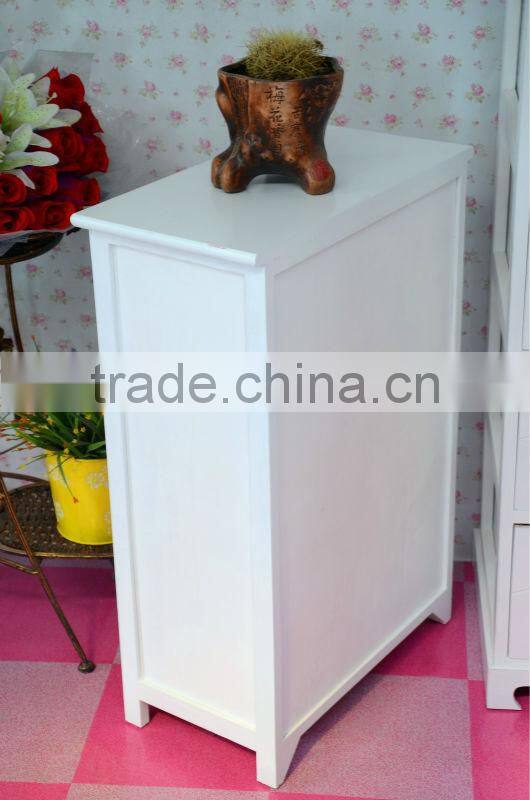 Small antique wooden storage cabinet in living room