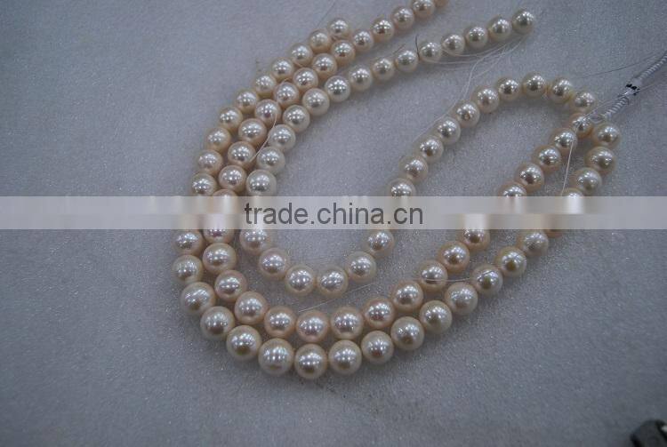 big 11-12mm white round freshwater pearl strand