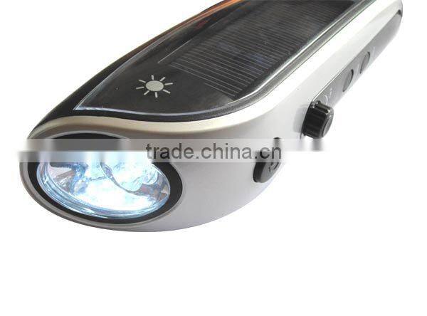 Winding charge solar flashlight radio