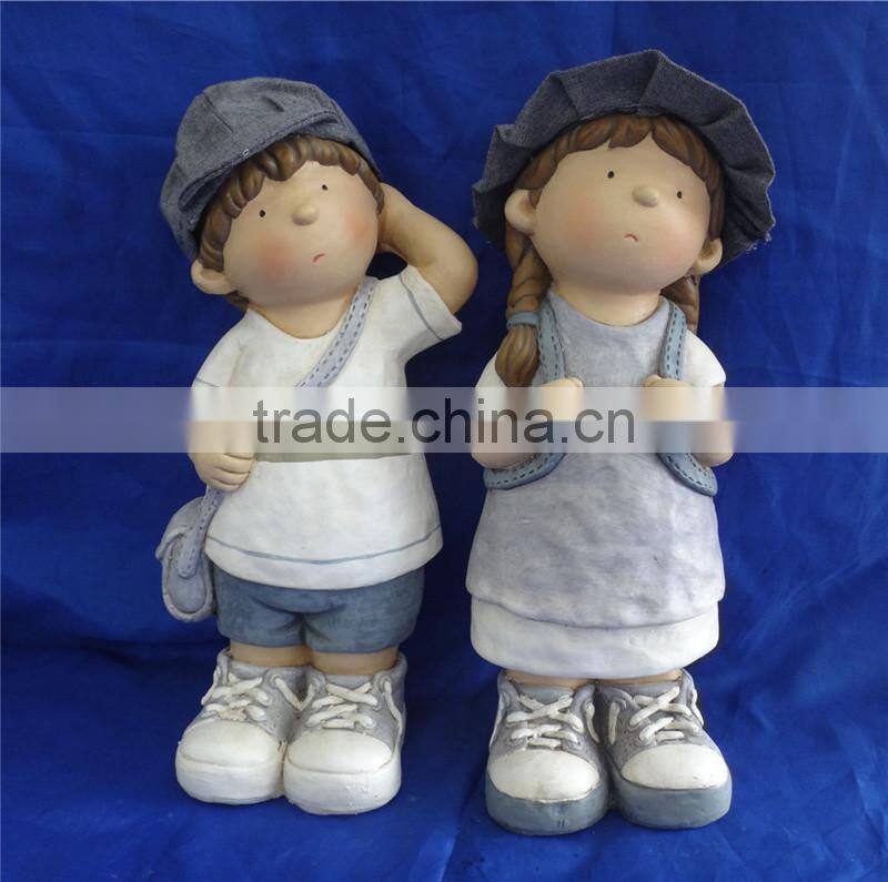 resin garden boy and girl statue