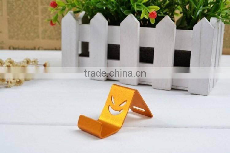 Universal Color Devil Smile Face Aluminum Metal Mini Cell Phone Holder Smartphone Hoder Phone Stand