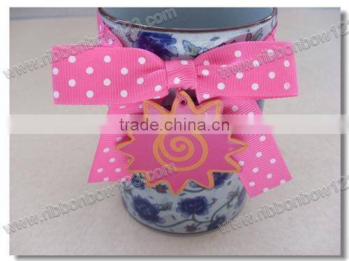 Pink logo ribbon bow with lable for gift