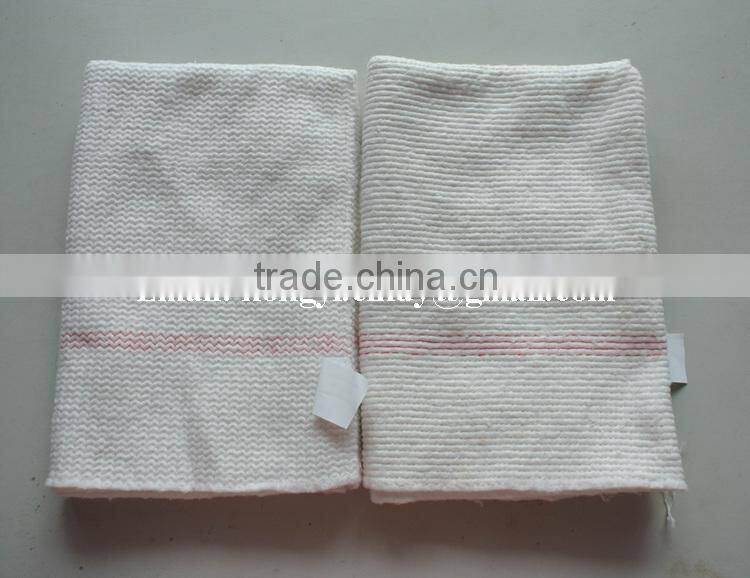 100%recycled cotton floor mop cloth with blue patch and hole in center