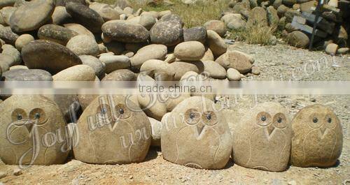 Carved Stone Owls, river stone owls