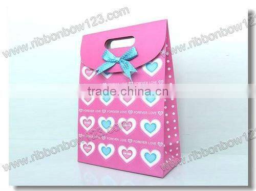 ribbon bow with elastic loop for packaging