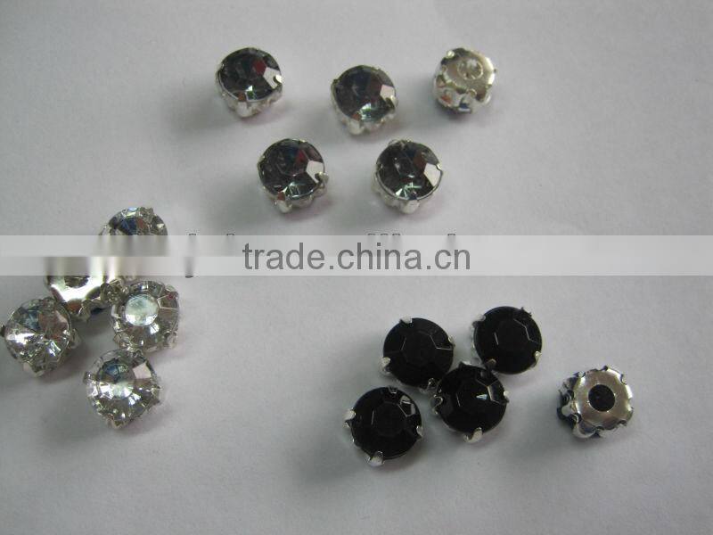 rhinestones in silver claw setting with two prongs