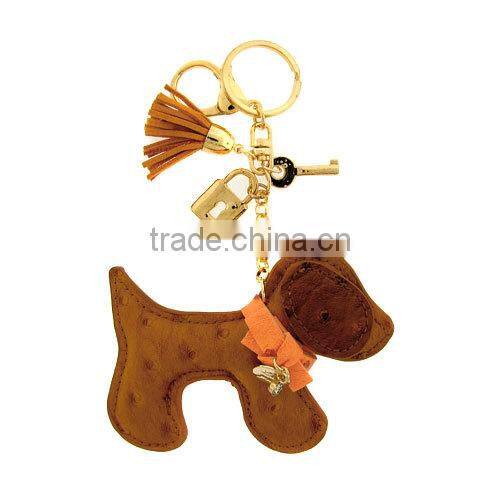 Brown cross keyring accented by spur fashion cross keychain