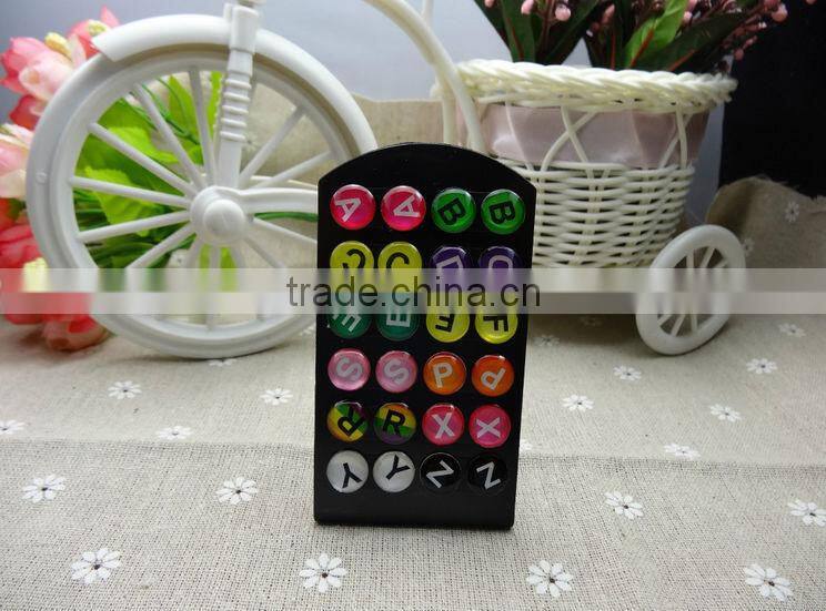 Oil drops adhesive letters stud earrings