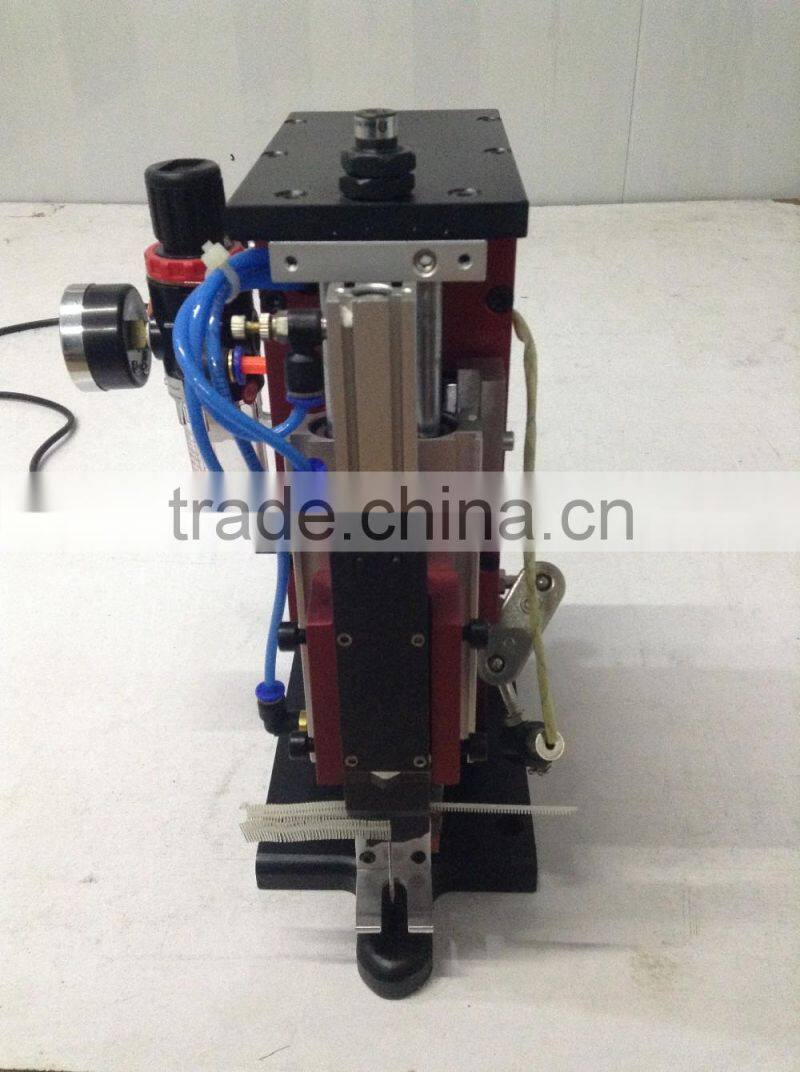 Booster tag pin machine