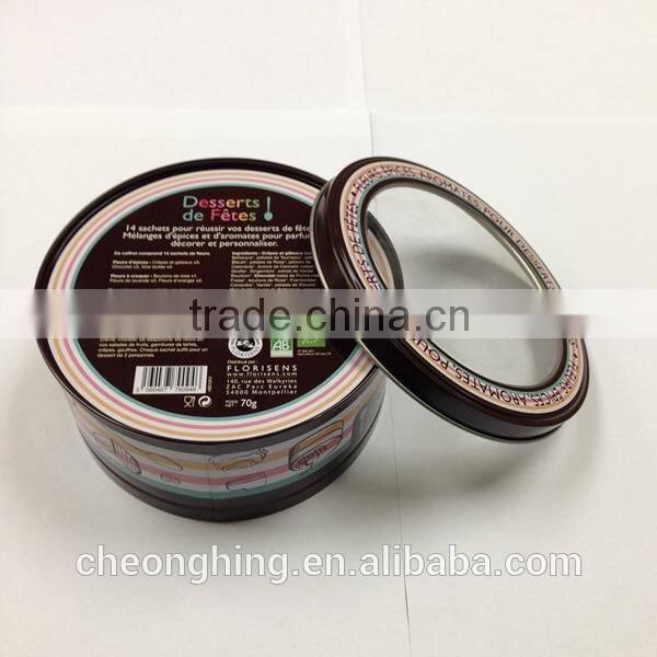 Round tin box with window
