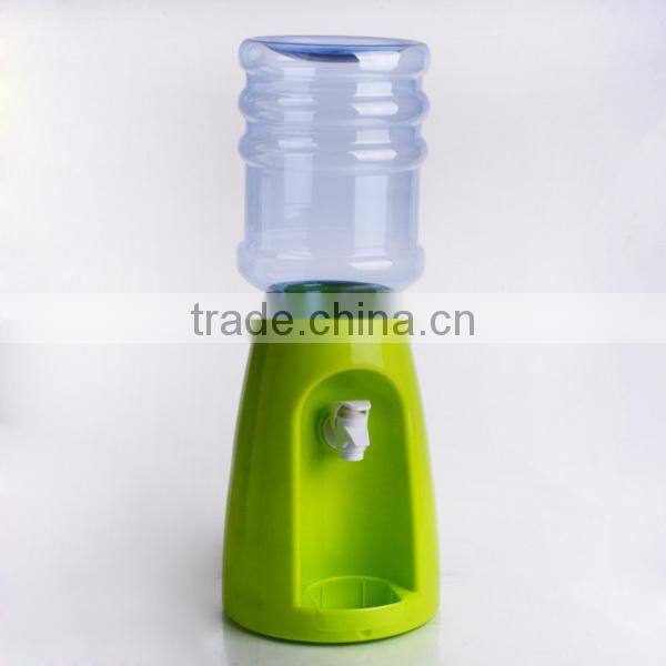 colorful plastic juice dispenser with blue stand and fire hydrant