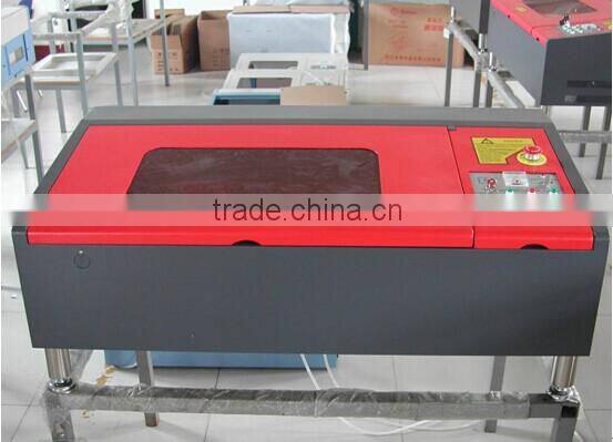 moshi software control good price high precision and speed fabric co2 laser engraving cutting machine on sale