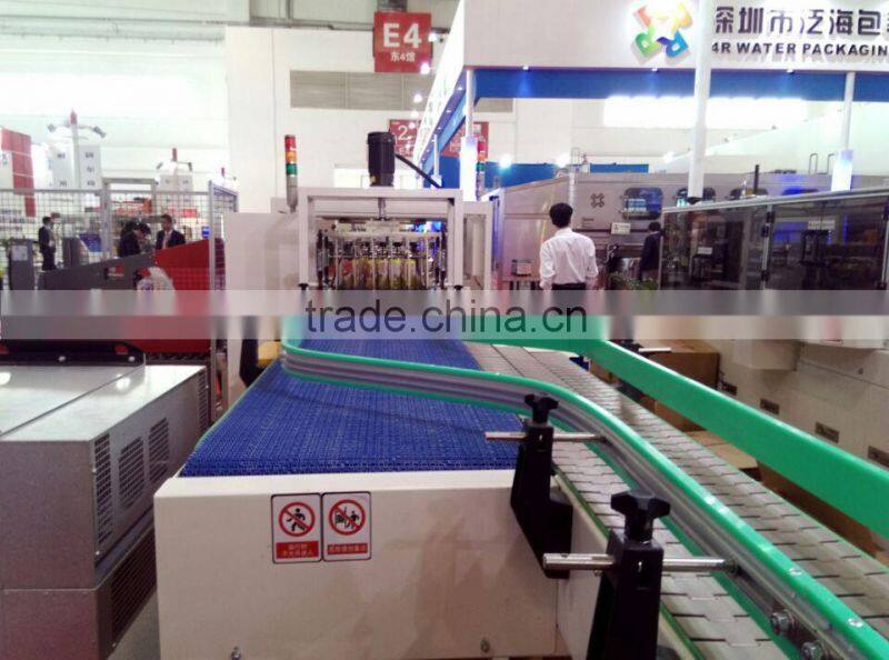 YK-ZX05 Economic cost Drop Type Case Filling Machine/case packer for beverage ,oil,mineral water and bottles