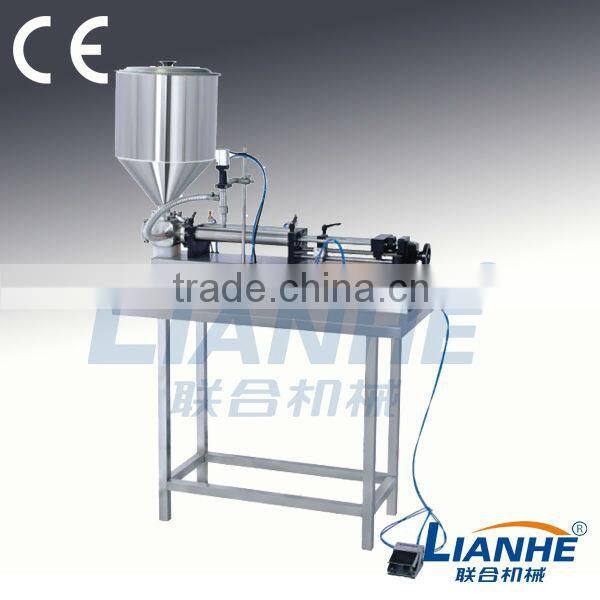 Liquid filling machine with a hopper/Liquid filling machine. water filling machine, oil filling machine